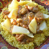 Куриные biryani с рисом и картофелем